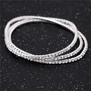 Macro shot of 2.0mm single row rhinestone elastic bracelet showing shimmering crystals