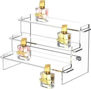 Soporte expositor de acrílico transparente de tres niveles para perfumes y coleccionables