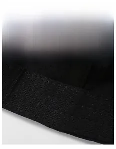 Detailed macro view of black breathable fabric with moisture-wicking technology on cap