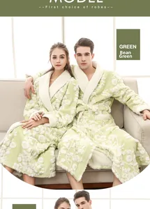 Close-up of thick pea green flannel robe with 3D floral jacquard and warm plush texture
