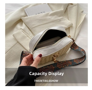 Internal view of woven PU leather bag with ethnic wide strap showing mobile phone capacity