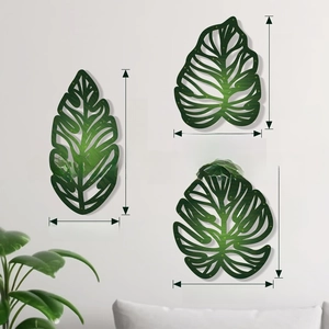 Detailed size specifications for three green wooden tropical leaf wall art decorations