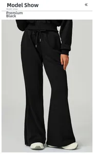 Close-up of premium black high-waisted wide-leg sweatpants with drawstring detail
