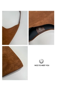 Detailed views of vintage brown faux suede shoulder bag with magnetic snap and stitching