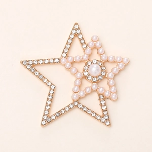 Elegant rose gold star brooch with shimmering rhinestones and central pearl detail
