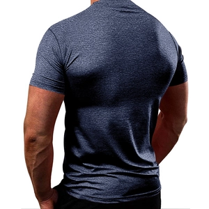 Macro detail of breathable navy blue quick-dry fabric on men's athletic fitted shirt