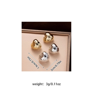 Detailed view of hammered heart stud earrings with size 1.9x2cm and weight 3g markings