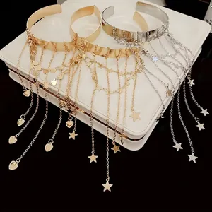 Adjustable metallic cuff bracelets with star and heart fringe tassels in gold and silver
