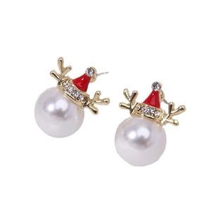 Close-up of Christmas pearl earrings with gold reindeer antlers and red enamel hat