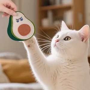 Interactive avocado-shaped felt cat toy with angry expression and built-in bell for play