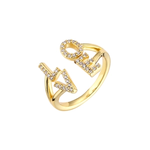 Detailed view of gold plated LOVE ring featuring micro-paved sparkling cubic zirconia