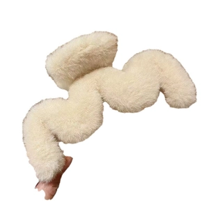 Large wavy plush hair claw clip in creamy white faux fur for women winter hair styling