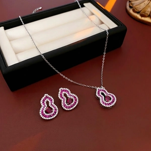 Luxury 925 silver gold-plated jewelry set with red ruby hollow gourd pendant and earrings