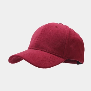 Detail of burgundy baseball cap made from warm fleece with six-panel design and curved brim