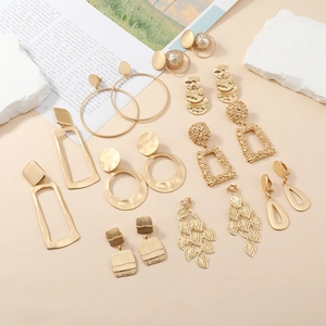 9-piece set of trendy gold alloy geometric earrings and ear cuffs with pearl accents