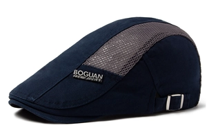 Detail of dark blue ivy cap showing grey breathable mesh and adjustable metal buckle