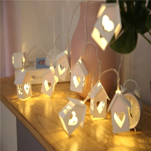 LED wooden house string lights with heart cutout for warm Christmas bedroom decoration