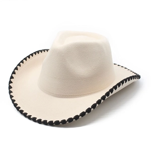 Detail of cream western cowboy hat featuring black decorative stitching on the brim