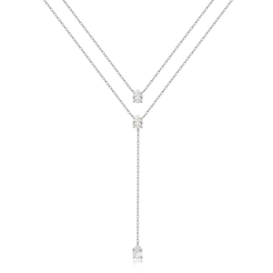 Detailed view of the double-layered Y-shaped necklace with pear-cut emerald gemstones