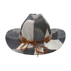 Detail of blue denim western cowboy hat with brown ribbon and ethnic pattern band