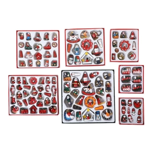 Assorted wooden Christmas tree ornaments featuring Santa and Snowman in gift boxes