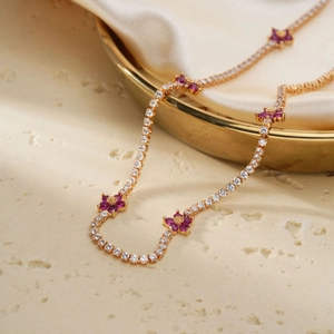 Chic rose gold flower necklace with pavé zircons and deep magenta floral accents