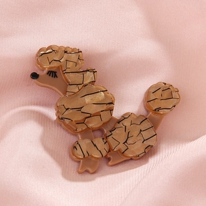 Elegant brown poodle brooch in acrylic with vintage cracked texture on pink silk