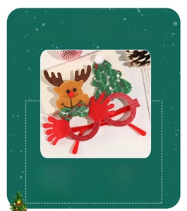 Detail of red sequin Christmas glasses with reindeer and green knit tree motifs