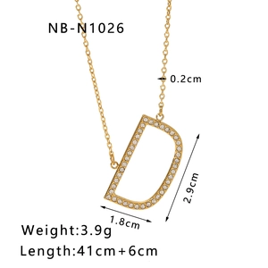 Detail of 18k gold plated letter D pendant necklace with crystal inlay and measurements