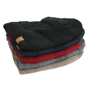 Set of five knitted beanies in diverse colors featuring leather F&S logo patches