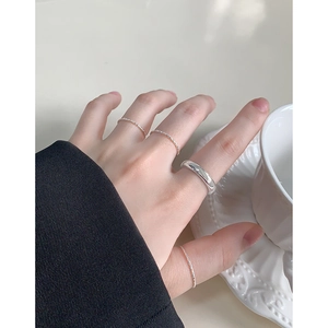 Minimalist S925 sterling silver ring set featuring a wide band and slim textured bands