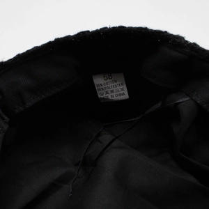 Macro view of inner care label showing 35% cotton and 65% polyester fabric composition