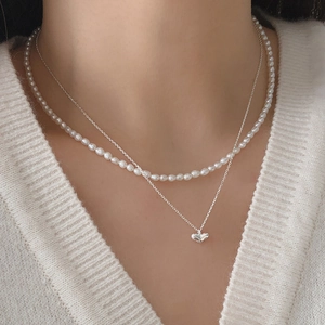 Double-layer sterling silver necklace set with heart pendant and white pearl choker