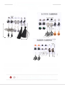 Detailed view of Halloween earring set featuring ghost, pumpkin, and bat designs