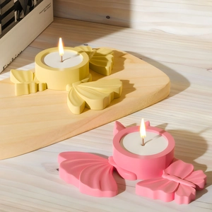 Portacandele in gesso a forma di farfalla rosa e giallo per la decorazione della casa