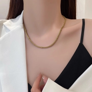 Elegant gold woven mesh necklace for women featuring a minimalist luxury statement design