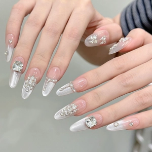 Silver cat eye press-on nails with luxury rhinestones and crystal butterfly accents