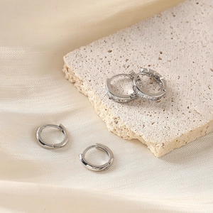 Minimalist silver pleated hoop earrings set with sparkling zircon crystal stones