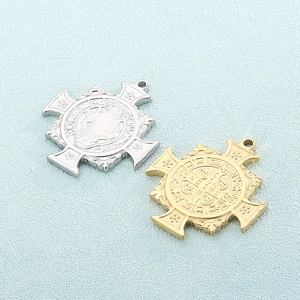 Saint Benedict Medal pendants in gold and silver finish with detailed religious engraving