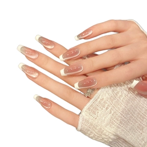 Elegant cat eye press-on nails with nude pink gradient and white French tips for women