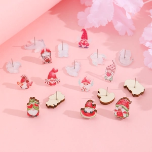 Detail of cute gnome and heart acrylic pins with stainless steel needle backing