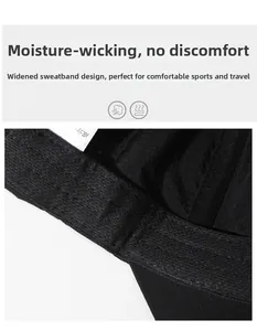 Detail of widened sweatband on breathable black running cap showing moisture-wicking fabric