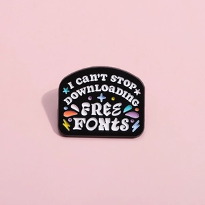 Cartoon geometric black enamel brooch with I Can't Stop Downloading Free Fonts slogan