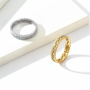 Polished titanium steel rings with cutout zigzag patterns in gold and silver finish