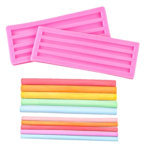 Pink silicone mold for handmade semicircular wax bars and chocolate cake decorations