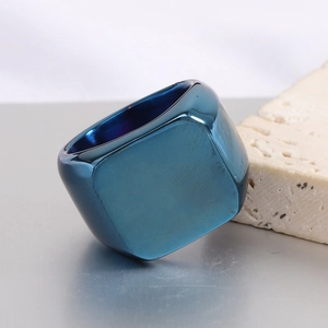 Detailed macro view of the polished deep blue square stainless steel minimalist ring