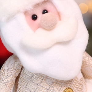 Macro shot of plush Santa doll featuring gold sequin details and soft white faux fur