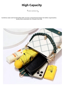 Interior storage view of green and white bucket bag holding a phone, umbrella and cosmetics