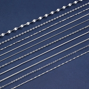 Assorted 925 sterling silver chain necklaces featuring various styles on a dark blue surface