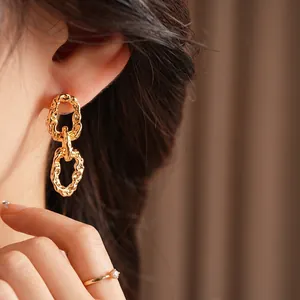 Textured 18K gold irregular chain link drop earrings with a vintage hammered metal finish